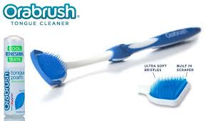 Orabrush is een perfect middel tegen witte aanslag op de tong.